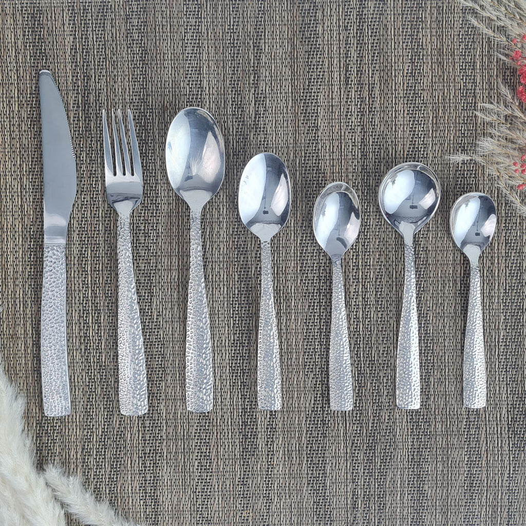 Set of stainless steel silver cutlery spoons, fork and knife