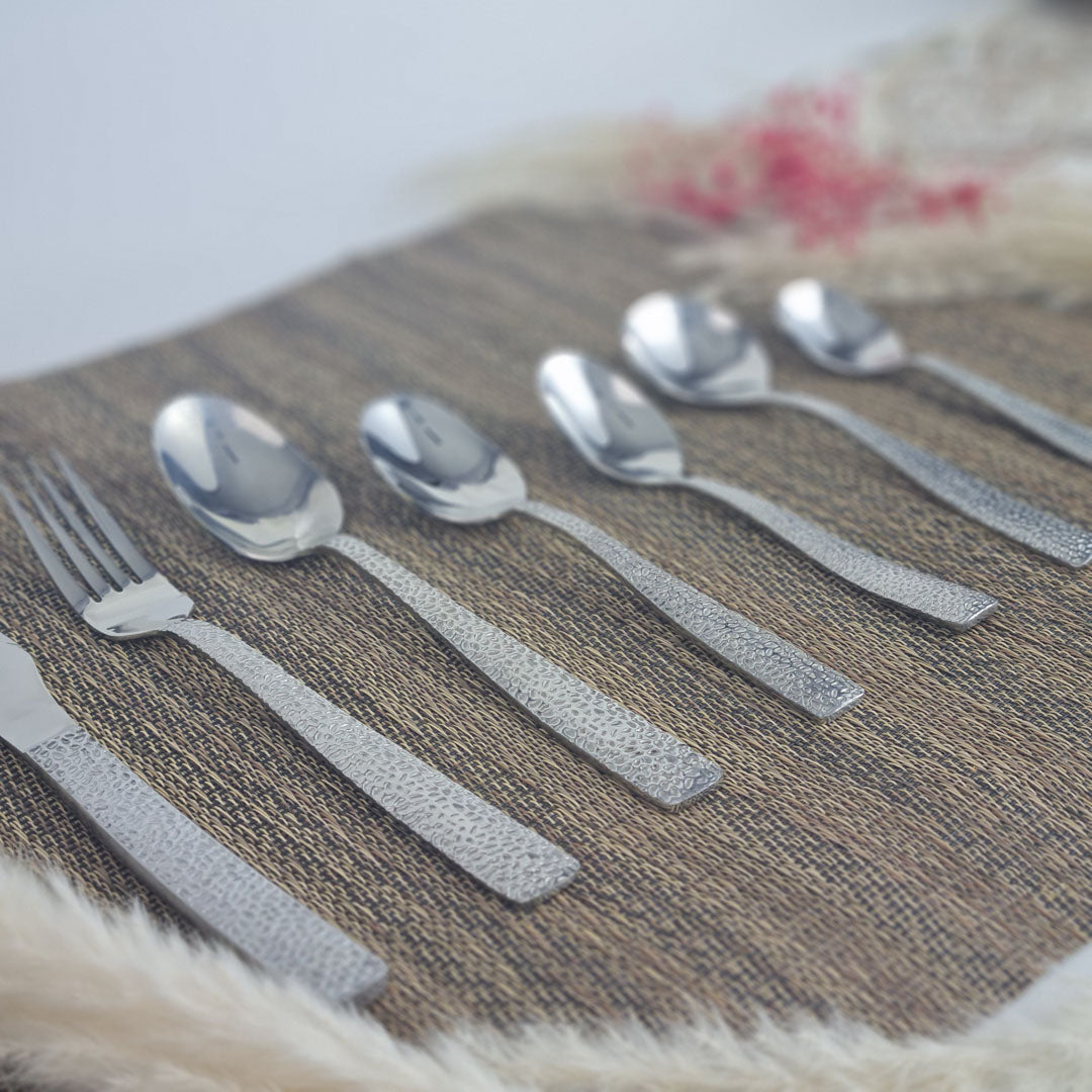 Set of stainless steel silver cutlery spoons, fork and knife