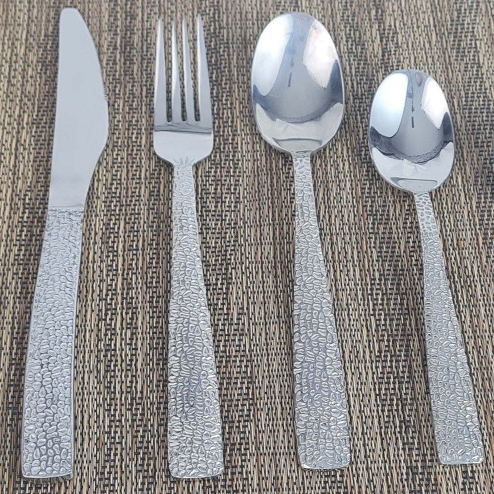 Set of stainless steel silver cutlery spoons, fork and knife