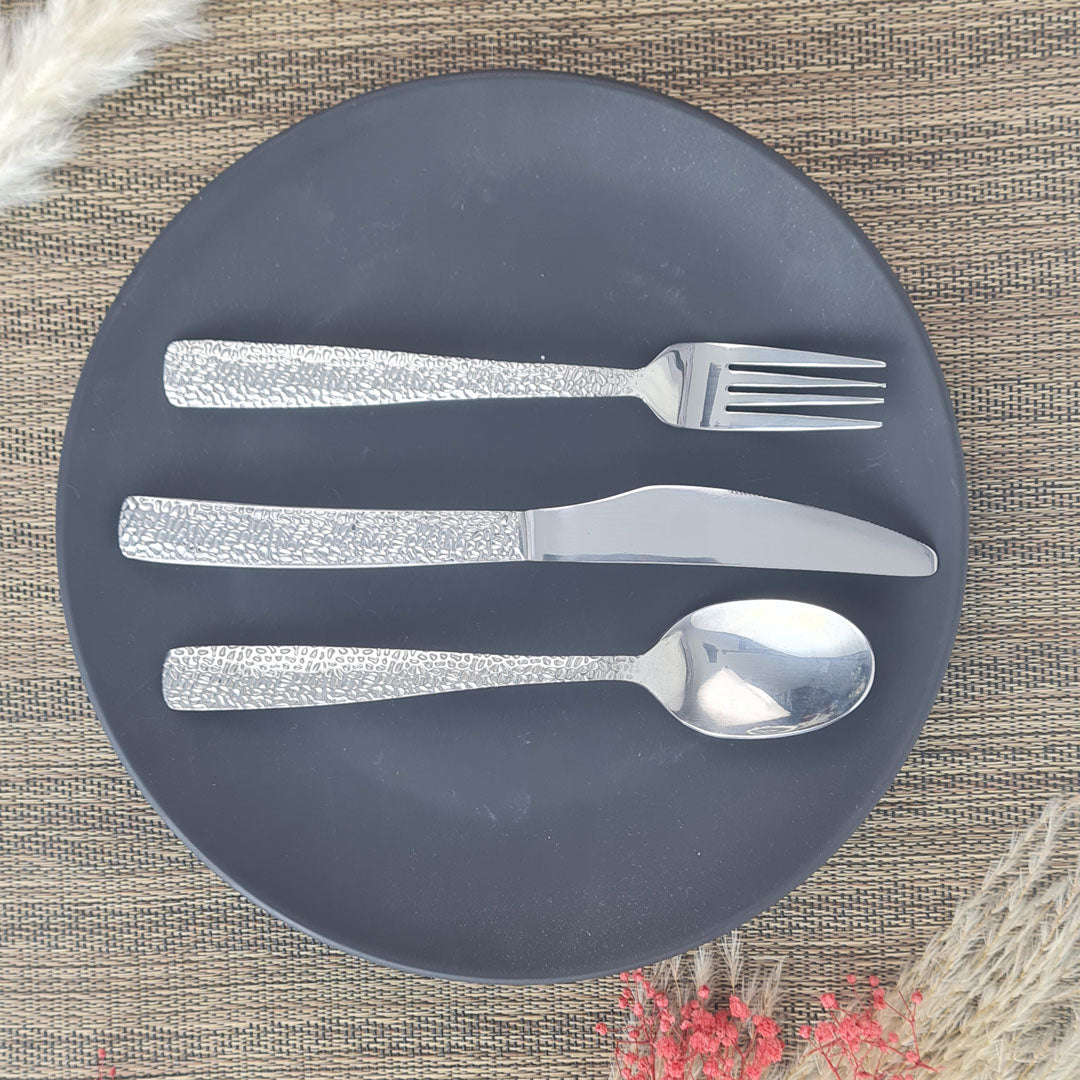 Set of stainless steel silver cutlery spoons, fork and knife