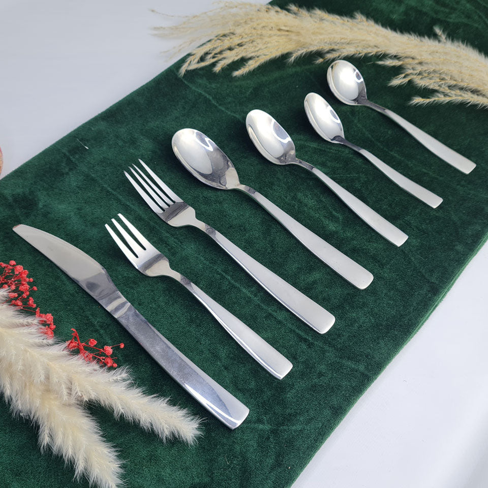 Set of stainless steel silver cutlery spoons, fork and knife