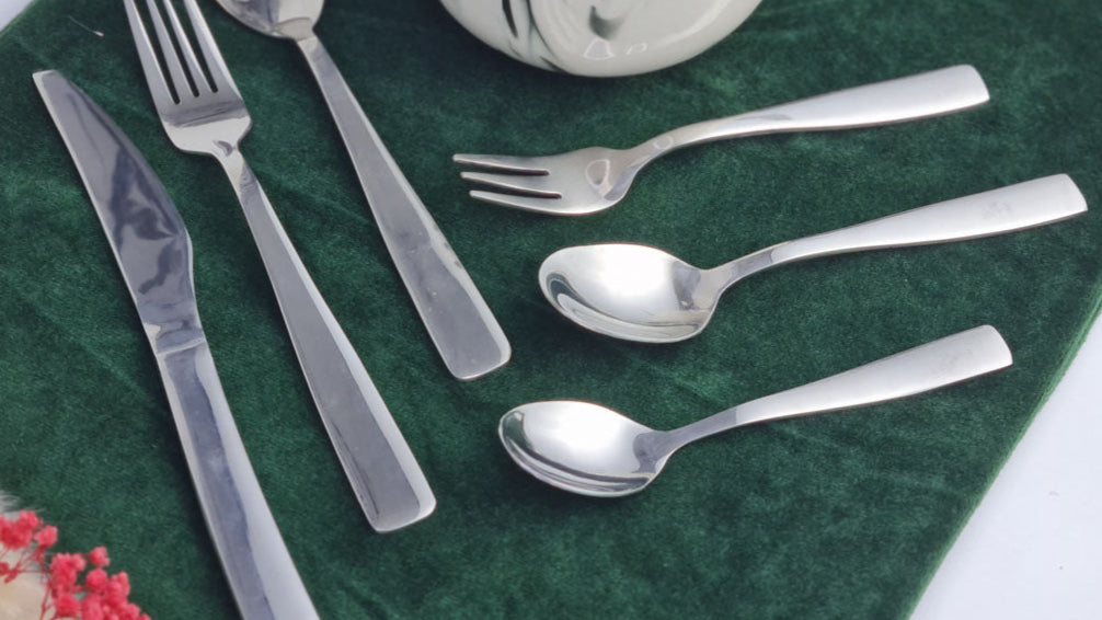 Set of stainless steel silver cutlery spoons, fork and knife