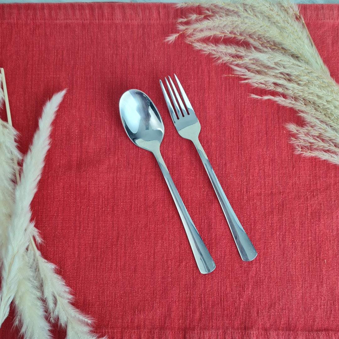 stainless steel silver cutlery spoons and a fork.