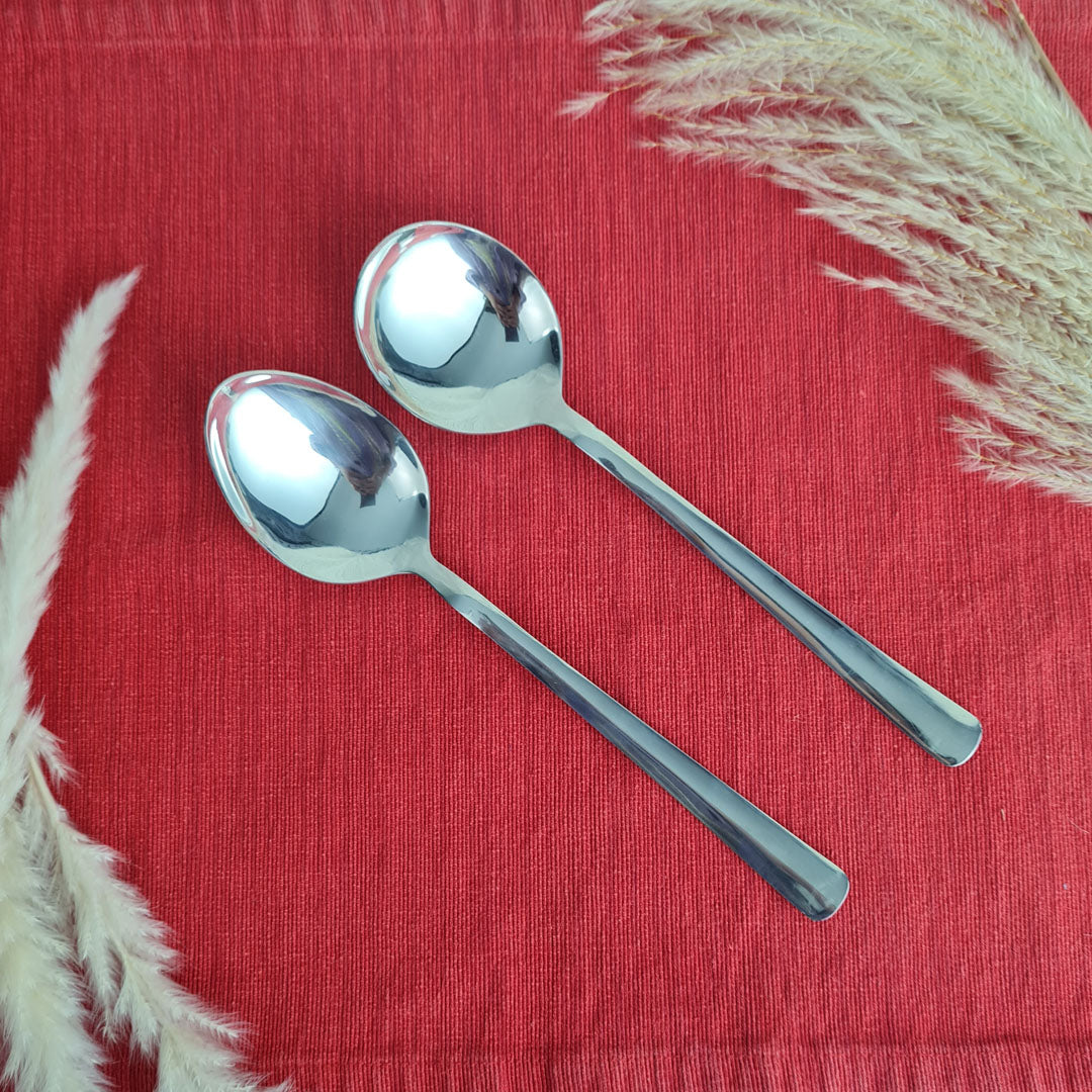 Set of stainless steel silver cutlery serving spoons